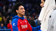 Dec 6, 2024; Philadelphia, Pennsylvania, USA; Philadelphia 76ers guard Jared McCain (20) reacts with Orlando Magic guard Anthony Black (0) after the game at Wells Fargo Center. Mandatory Credit: Kyle Ross-Imagn Images