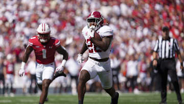 Sep 14, 2024; Madison, Wisconsin, USA;  Alabama Crimson Tide running back Jam Miller (26) rushes for a touchdown during the third quarter against the Wisconsin Badgers at Camp Randall Stadium. Mandatory Credit: Jeff Hanisch-Imagn Images