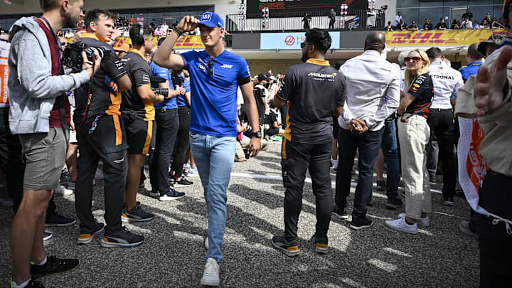 Oct 23, 2022; Austin, Texas, USA; Haas F1 Team driver Mick Schumacher (47) of Team Germany walks on to the track before the running of the U.S. Grand Prix F1 race at Circuit of the Americas. Mandatory Credit: Jerome Miron-Imagn Images