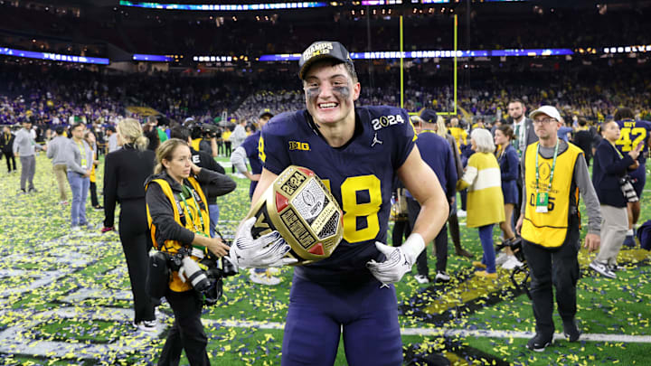 Jan 8, 2024; Houston, TX, USA; Michigan Wolverines tight end Colston Loveland (18) celebrates after winning 2024 College Football Playoff national championship game against the Washington Huskies at NRG Stadium. Mandatory Credit: Thomas Shea-Imagn Images