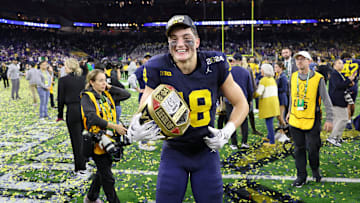 Jan 8, 2024; Houston, TX, USA; Michigan Wolverines tight end Colston Loveland (18) celebrates after winning 2024 College Football Playoff national championship game against the Washington Huskies at NRG Stadium. Mandatory Credit: Thomas Shea-Imagn Images