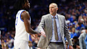 Nov 7, 2025; Lexington, Kentucky, USA; Kentucky Wildcats head coach Mark Pope fives guard Kam Williams (3) as he returns to the bench during the first half against the Valparaiso Beacons at Rupp Arena at Central Bank Center. Mandatory Credit: Jordan Prather-Imagn Images