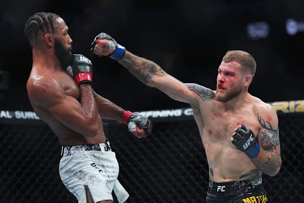 Jake Matthews fights Phil Rowe during UFC 302 at Prudential Center. 