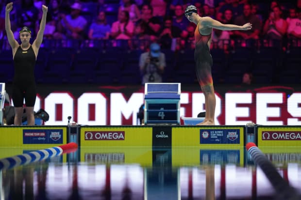 Katie Ledecky stretches ahead of the 800-meter freestyle final at US trials. 