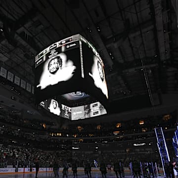 The Dallas Stars and Anaheim Ducks observe a moment of silence to honor Dallas Cowboys defensive end Marshawn Kneeland