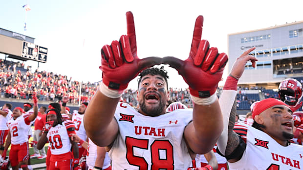 Sep 14, 2024; Logan, Utah, USA; Utah Utes defensive tackle Junior Tafuna (58) celebrates with teammates after defeating the U