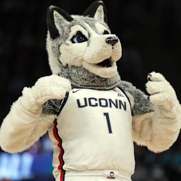 Apr 3, 2022; Minneapolis, MN, USA; UConn Huskies mascot cheers during a break against the South Carolina Gamecocks  during the first half in the Final Four championship game of the women's college basketball NCAA Tournament at Target Center. Mandatory Credit: Kirby Lee-Imagn Images
