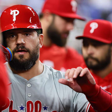 Sep 6, 2024; Miami, Florida, USA; Philadelphia Phillies designated hitter Kyle Schwarber (12) celebrates after scoring against the Miami Marlins during the first inning at loanDepot Park. 