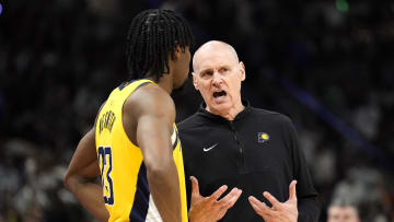 Apr 30, 2024; Milwaukee, Wisconsin, USA;  Indiana Pacers head coach Rick Carlisle talks with forward Aaron Nesmith (23) during the fourth quarter against the Milwaukee Bucks during game five of the first round for the 2024 NBA playoffs at Fiserv Forum. Mandatory Credit: Jeff Hanisch-USA TODAY Sports