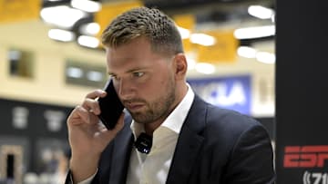 Aug 2, 2025; El Segundo, CA, USA; Los Angeles Lakers Luka Doncic (77) is interviewed by ESPN LA radio following a press conference announcing the signing of a 3-year, $165 million contract extension at UCLA Health Training Center. Mandatory Credit: Jayne Kamin-Oncea-Imagn Images