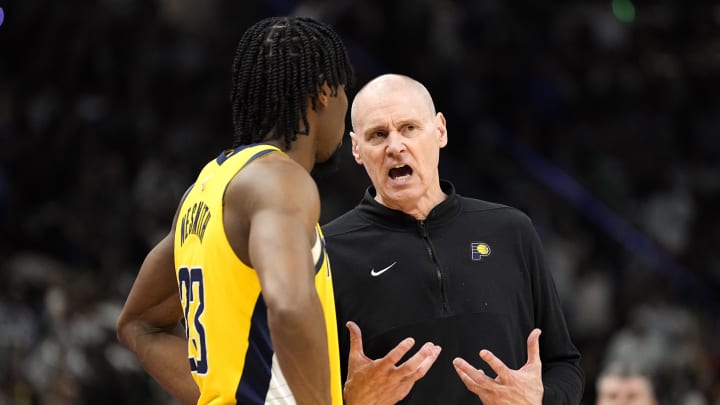 Apr 30, 2024; Milwaukee, Wisconsin, USA;  Indiana Pacers head coach Rick Carlisle talks with forward Aaron Nesmith (23) during the fourth quarter against the Milwaukee Bucks during game five of the first round for the 2024 NBA playoffs at Fiserv Forum. Mandatory Credit: Jeff Hanisch-USA TODAY Sports