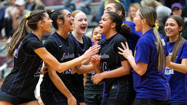 Johnston celebrates a pair of go ahead free thows by Johnston's Ari Phillips (14) on Friday, Jan. 24, 2025, at Dowling Catholic High School.