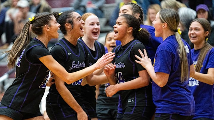 Johnston celebrates a pair of go-ahead free throws by Johnston's Ari Phillips (14) in a win over West Des Moines Dowling. Johnston celebrates a pair of go-ahead free throws by Johnston's Ari Phillips (14) in a win over West Des Moines Dowling.
