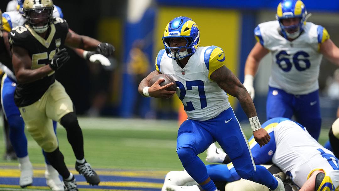 Aug 22, 2026; Inglewood, California, USA; Los Angeles Rams running back Jarquez Hunter (27) carries the ball against the New Orleans Saints in the first half at SoFi Stadium. Mandatory Credit: Kirby Lee-Imagn Images