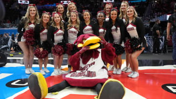 South Carolina Gamecocks mascot Cocky with the USC cheerleaders