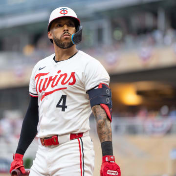 Jul 2, 2024; Minneapolis, Minnesota, USA; Minnesota Twins shortstop Carlos Correa (4) regroups after hitting a foul ball against Detroit Tigers pitcher Tarik Skubal (29) at Target Field.