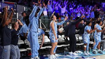 Nov 25, 2024; Paradise Island, Bahamas, BHS; North Carolina Tar Heels guard Alyssa Ustby (1) dances with the bench during the second half against the Indiana Hoosiers at the Atlantis Resort. Mandatory Credit: Kevin Jairaj-Imagn Images