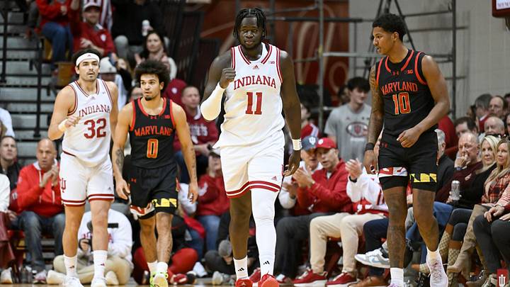 Jan 26, 2025; Bloomington, Indiana, USA; Indiana Hoosiers center Oumar Ballo (11) celebrates after forcing a turnover against Maryland Terrapins forward Julian Reese (10) during the first half at Simon Skjodt Assembly Hall. Mandatory Credit: Robert Goddin-Imagn Images