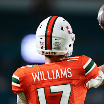 Oct 21, 2023; Miami Gardens, Florida, USA; Miami Hurricanes quarterback Emory Williams (17) warms up prior to a game against the Clemson Tigers at Hard Rock Stadium. Mandatory Credit: Rich Storry-Imagn Images