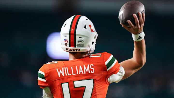 Oct 21, 2023; Miami Gardens, Florida, USA; Miami Hurricanes quarterback Emory Williams (17) warms up prior to a game against the Clemson Tigers at Hard Rock Stadium. Mandatory Credit: Rich Storry-Imagn Images