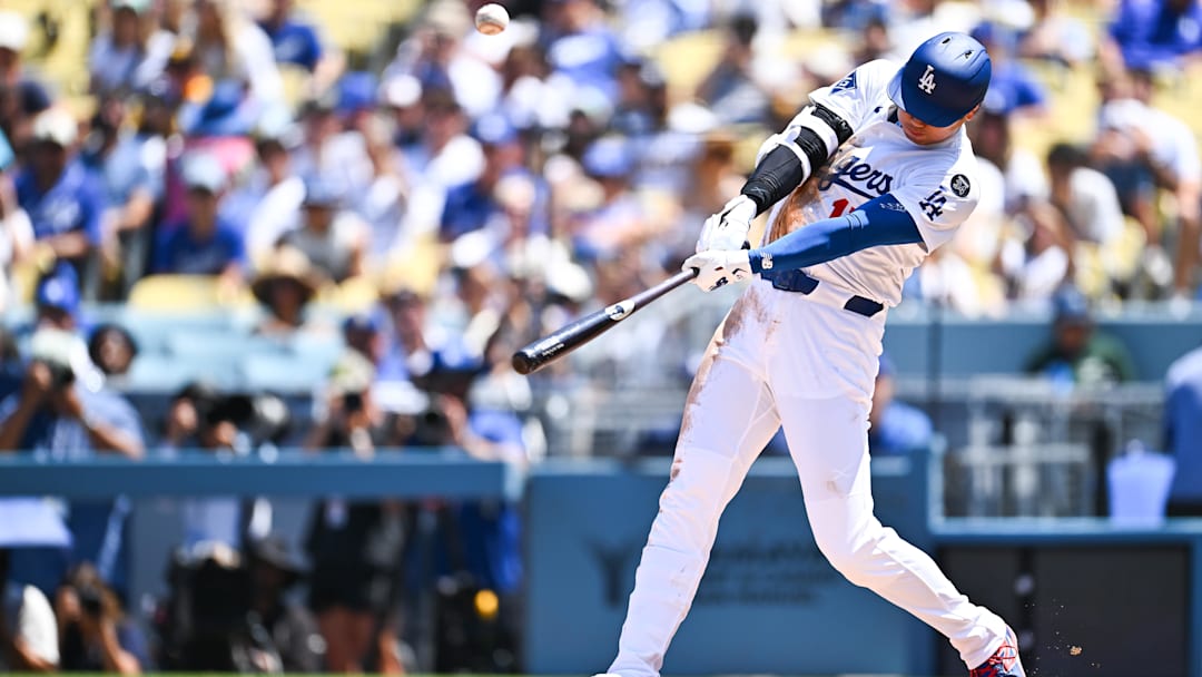 Aug 17, 2025; Los Angeles, California, USA; Los Angeles Dodgers designated hitter Shohei Ohtani (17) flies out  during the second inning against the San Diego Padres at Dodger Stadium. Mandatory Credit: Jonathan Hui-Imagn Images