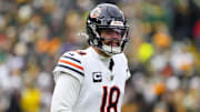 Jan 5, 2025; Green Bay, Wisconsin, USA;  Chicago Bears quarterback Caleb Williams (18) during the game against the Chicago Bears at Lambeau Field. Mandatory Credit: Jeff Hanisch-Imagn Images
