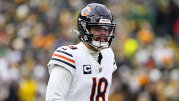 Jan 5, 2025; Green Bay, Wisconsin, USA;  Chicago Bears quarterback Caleb Williams (18) during the game against the Chicago Bears at Lambeau Field. Mandatory Credit: Jeff Hanisch-Imagn Images