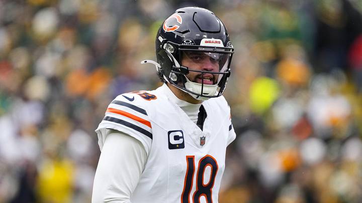 Jan 5, 2025; Green Bay, Wisconsin, USA;  Chicago Bears quarterback Caleb Williams (18) during the game against the Chicago Bears at Lambeau Field. Mandatory Credit: Jeff Hanisch-Imagn Images