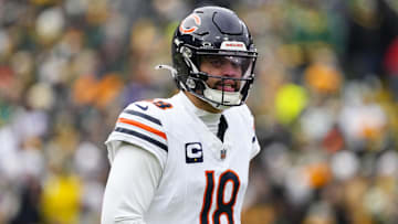 Jan 5, 2025; Green Bay, Wisconsin, USA;  Chicago Bears quarterback Caleb Williams (18) during the game against the Chicago Bears at Lambeau Field. Mandatory Credit: Jeff Hanisch-Imagn Images