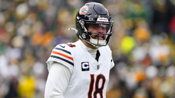 Jan 5, 2025; Green Bay, Wisconsin, USA;  Chicago Bears quarterback Caleb Williams (18) during the game against the Chicago Bears at Lambeau Field. Mandatory Credit: Jeff Hanisch-Imagn Images