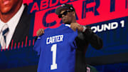 Carter was handed No. 1 on draft night, but tried to get himself a couple of retired numbers for his actual on-field digits.