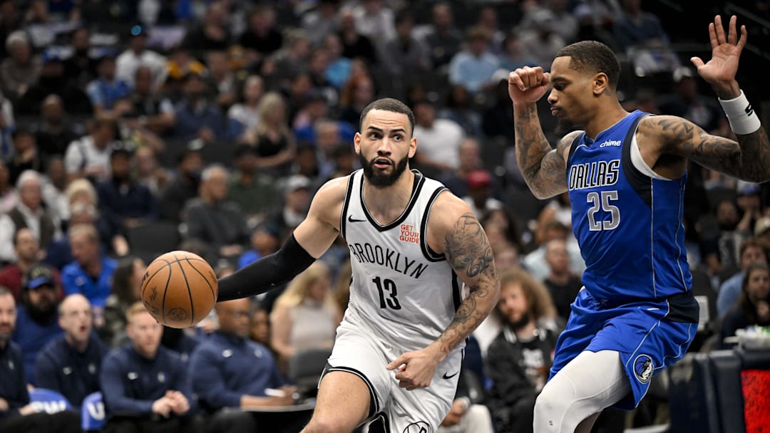 Mar 31, 2025; Dallas, Texas, USA; Brooklyn Nets guard Tyrese Martin (13) and Dallas Mavericks forward P.J. Washington (25) in action during the game between the Dallas Mavericks and the Brooklyn Nets at the American Airlines Center. Mandatory Credit: Jerome Miron-Imagn Images