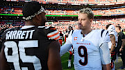 Oct 20, 2024; Cleveland, Ohio, USA; Cincinnati Bengals quarterback Joe Burrow (9) and Cleveland Browns defensive end Myles Garrett (95) talk after the game at Huntington Bank Field. Mandatory Credit: Ken Blaze-Imagn Images