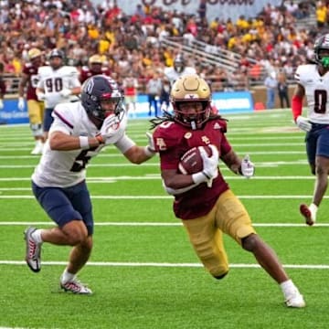 Boston College running back Treshaun Ward running into the end zone for a 30-yard touchdown catch in the second quarter vs the Duquesne Dukes. Mandatory credit: Barry Chin/Globe Staff