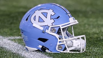Oct 28, 2023; Atlanta, Georgia, USA; A detailed view of a North Carolina Tar Heels helmet on the field before a game against the Georgia Tech Yellow Jackets at Bobby Dodd Stadium at Hyundai Field. Mandatory Credit: Brett Davis-Imagn Images