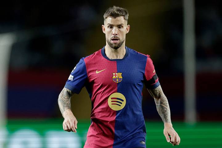 Inigo Martinez Inigo Martinez defending for Barcelona