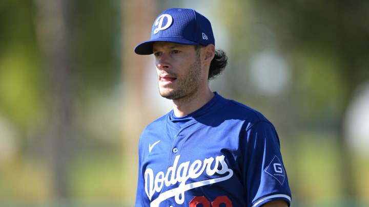 Feb 17, 2024; Glendale, AZ, USA;  Los Angeles Dodgers relief pitcher Joe Kelly (99) looks on during spring training at Camelback Ranch. Mandatory Credit: Jayne Kamin-Oncea-USA TODAY Sports