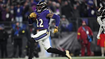 Jan 11, 2025; Baltimore, Maryland, USA; Baltimore Ravens running back Derrick Henry (22) runs to score a touchdown against the Pittsburgh Steelers in the third quarter in an AFC wild card game at M&T Bank Stadium. Mandatory Credit: Tommy Gilligan-Imagn Images