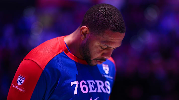 Dec 6, 2024; Philadelphia, Pennsylvania, USA; Philadelphia 76ers guard Eric Gordon (23) observes the national anthem before the game against the Orlando Magic at Wells Fargo Center. Mandatory Credit: Kyle Ross-Imagn Images