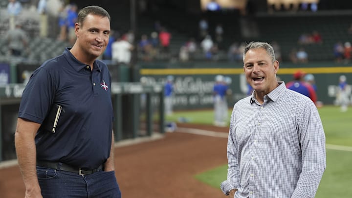 Jun 21, 2024; Arlington, Texas, USA; Texas Rangers general manager Chris Young (left) and Kansas City Royals general manager J.J. Picollo (right) talk before the game against the Kansas City Royals at Globe Life Field. Jun 21, 2024; Arlington, Texas, USA; Texas Rangers general manager Chris Young (left) and Kansas City Royals general manager J.J. Picollo (right) talk before the game against the Kansas City Royals at Globe Life Field.