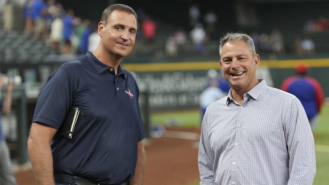 Jun 21, 2024; Arlington, Texas, USA; Texas Rangers general manager Chris Young (left) and Kansas City Royals general manager J.J. Picollo (right) talk before the game against the Kansas City Royals at Globe Life Field. Mandatory Credit: Jim Cowsert-Imagn Images Jun 21, 2024; Arlington, Texas, USA; Texas Rangers general manager Chris Young (left) and Kansas City Royals general manager J.J. Picollo (right) talk before the game against the Kansas City Royals at Globe Life Field. Mandatory Credit: Jim Cowsert-Imagn Images
