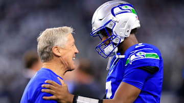 Pete Carroll with Geno Smith.