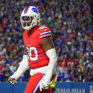 Oct 15, 2023; Orchard Park, New York, USA; Buffalo Bills defensive end Shaq Lawson (90) reacts to making a stop to force a punt against the New York Giants during the first half at Highmark Stadium. Mandatory Credit: Gregory Fisher-Imagn Images