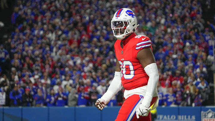 Oct 15, 2023; Orchard Park, New York, USA; Buffalo Bills defensive end Shaq Lawson (90) reacts to making a stop to force a punt against the New York Giants during the first half at Highmark Stadium. Mandatory Credit: Gregory Fisher-Imagn Images