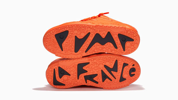 LaMelo Ball's red and black PUMA sneakers.