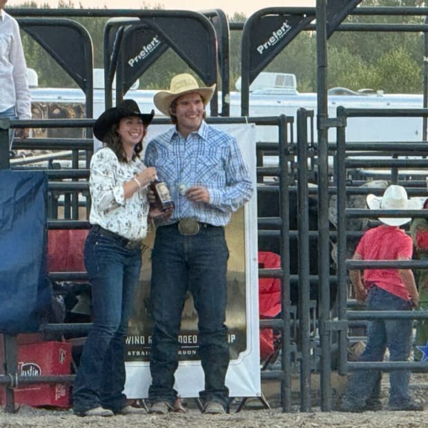 Wyoming Whiskey presenting Zach Hamar with his bottle of whiskey