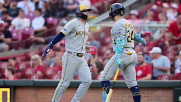 Milwaukee Brewers players Brice Turang and William Contreras.