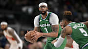 Oct 26, 2025; Dallas, Texas, USA; Dallas Mavericks forward Anthony Davis (3) looks to hand the ball off to guard D'Angelo Russell (5) during the second quarter against the Toronto Raptors at the American Airlines Center. Mandatory Credit: Jerome Miron-Imagn Images