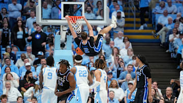 Mar 8, 2025; Chapel Hill, North Carolina, USA; Duke Blue Devils forward Cooper Flagg (2) scores in the second half at Dean E. Smith Center. Mandatory Credit: Bob Donnan-Imagn Images