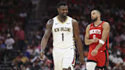 Mar 8, 2025; Houston, Texas, USA;  New Orleans Pelicans forward Zion Williamson (1) and Houston Rockets forward Dillon Brooks (9) react after a play during the third quarter at Toyota Center. Mandatory Credit: Troy Taormina-Imagn Images